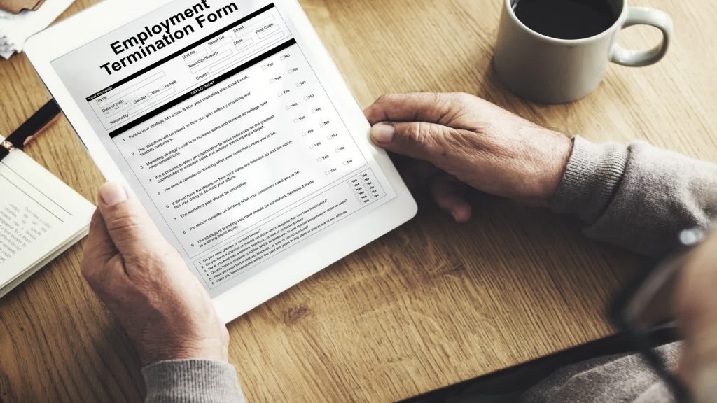 Employment termination form on a clipboard