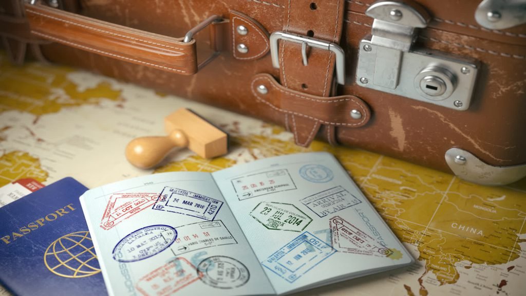 Passports and travel documents with a suitcase