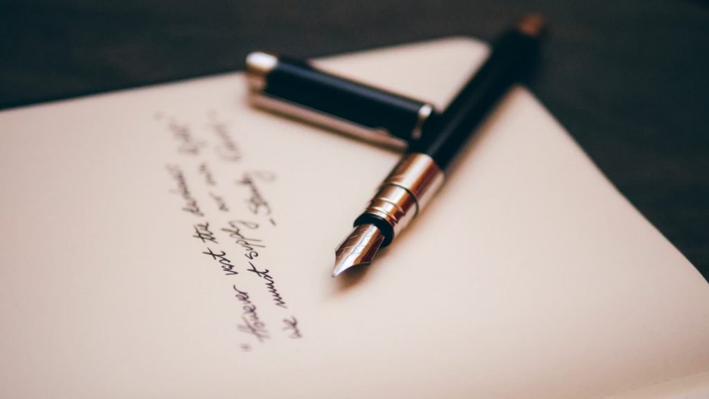 Fountain pen resting on a will